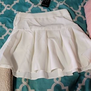 White pleated skirt